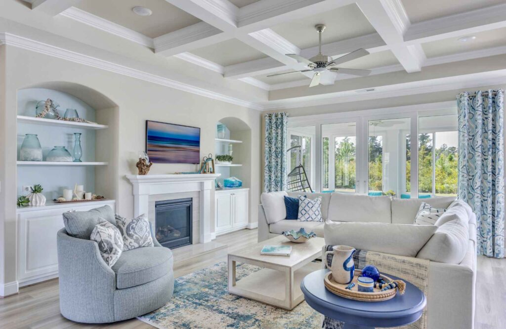 dwelling-place-interiors-leland-nc-creating-a-home-where-you-can-love-your-family-well-elevated-living-room-blue-and-white-colors-coastal-built-ins-timeless