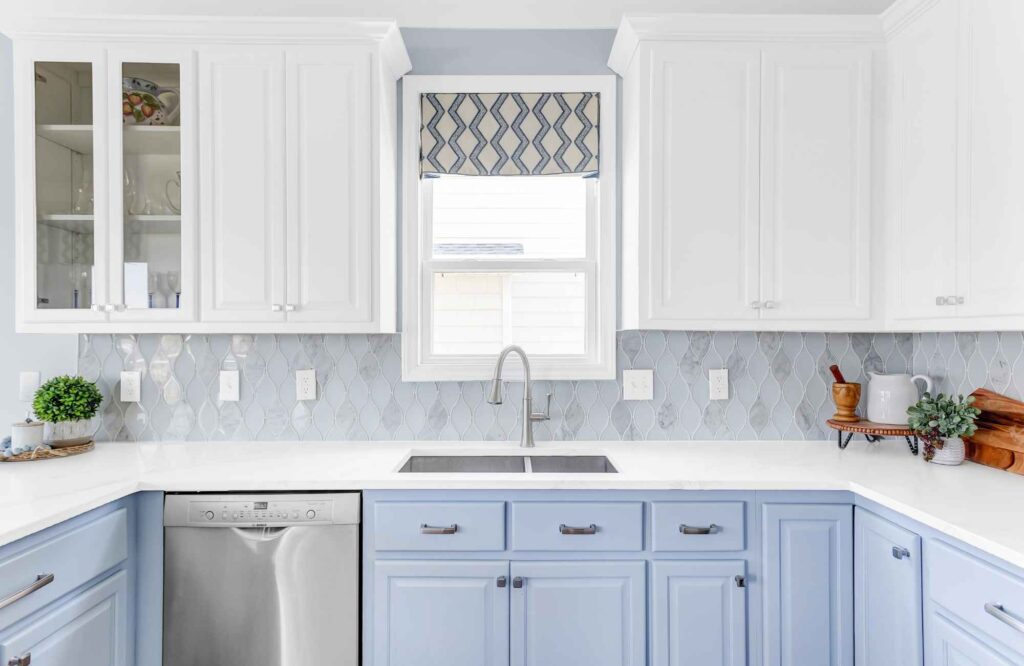 full-service-interior-design-wilmington-nc-should-you-refresh-or-gut-your-kitchen-remodeled-kitchen-with-blue-and-white-cabinets-fresh-livable-design